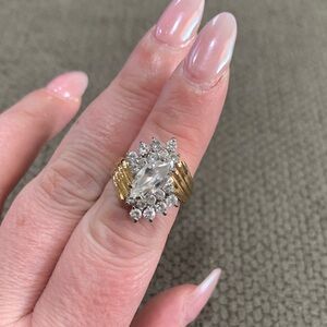 Stunning clear marquis on gold band